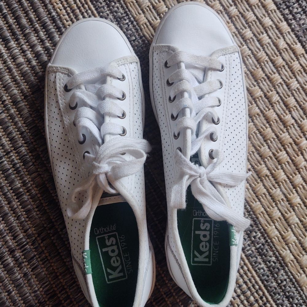 White leather hole lace keds